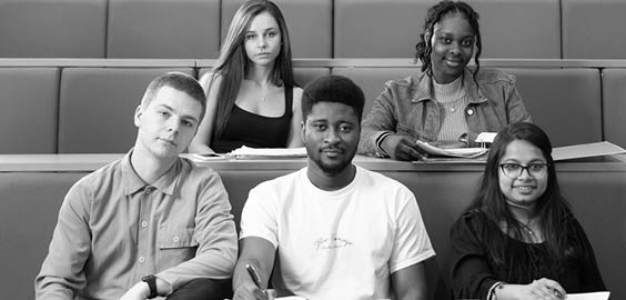 a group of people sitting at a table