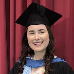 Woman smiling at graduation