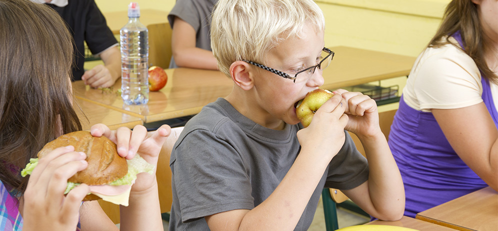 Image of children having breakfast at school