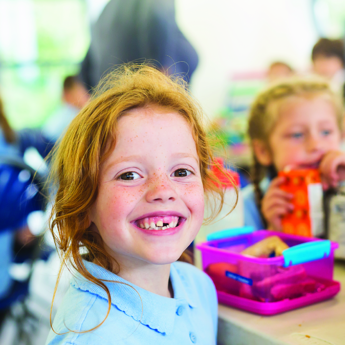 School child smiling