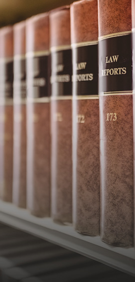 a stack of books on a shelf