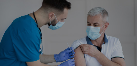 Healthcare professional injecting a patient