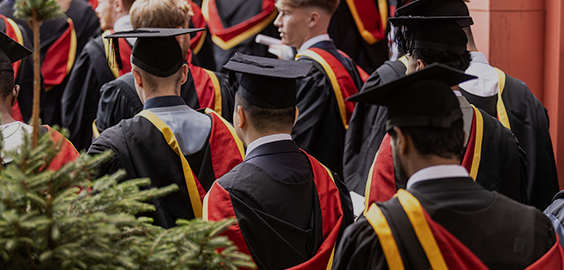 students walking around for graduation