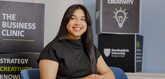 student smiling at camera