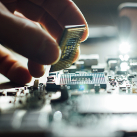 image of person building a circuitbord 