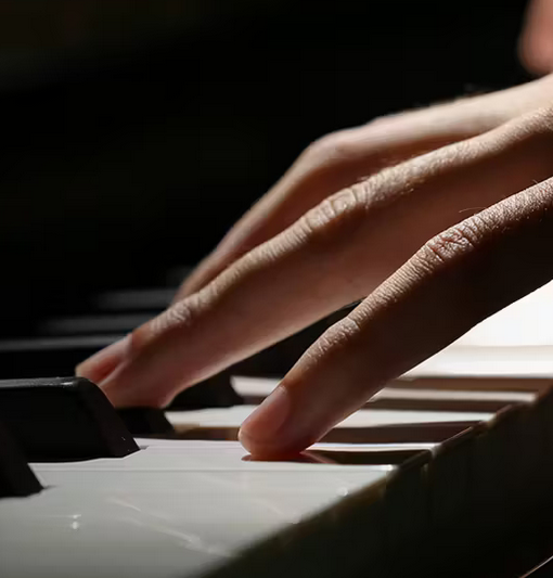 fingers playing keyboard