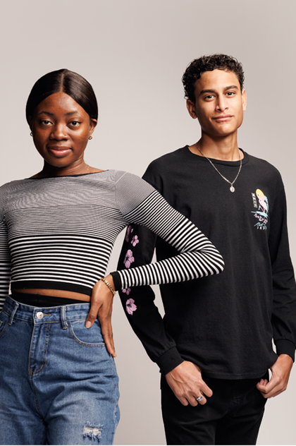 male and female standing looking to camera