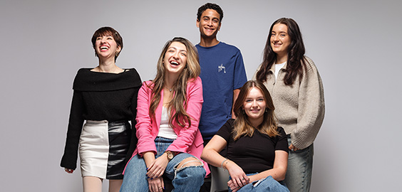 Group of undergraduate students smiling and laughing