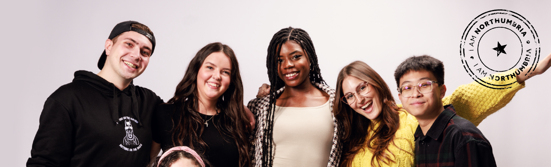 group of students smiling to camera