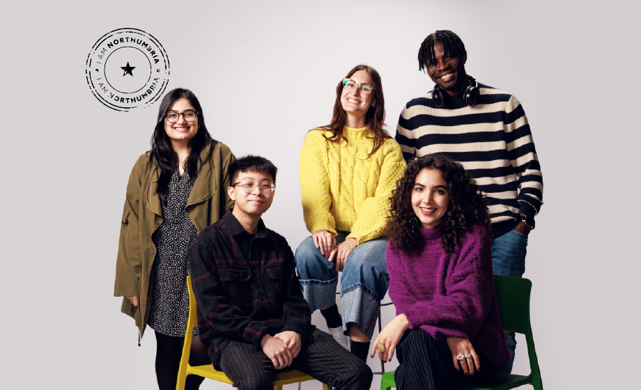 students smiling to camera