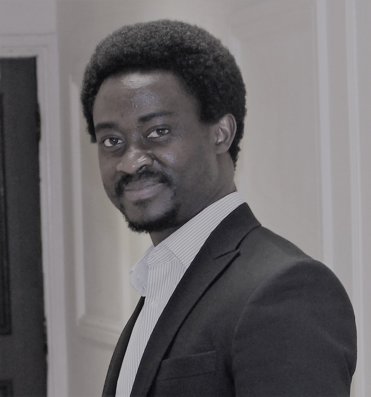 Picture of Onaopepo Adeniyi smiling at camera