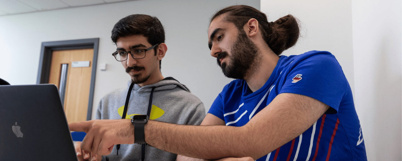 computer science students working together on a project