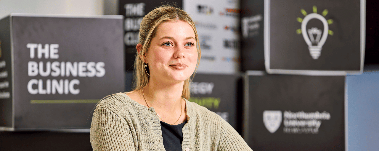 girl smiling at the business clinic