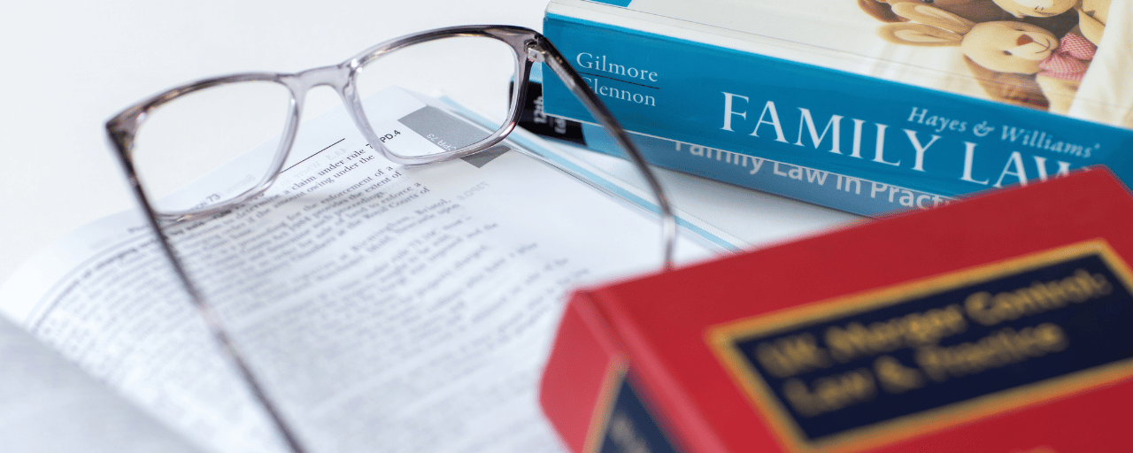 close-up of law books and eye glasses