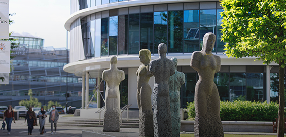 Exterior of building with statues outside
