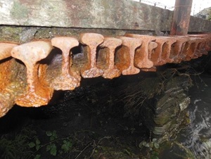 Caption: Victorian bridge deck improvised from old rails on the Ffestiniog Railway