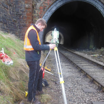 Caption: Final year student undertaking an earthworks survey on the Keighley and Worth Valley Railway as part of their thesis project