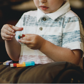 Image showing child playing with lego