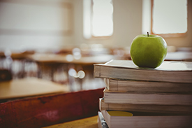 Apple And Books At School - Secondary School - Web