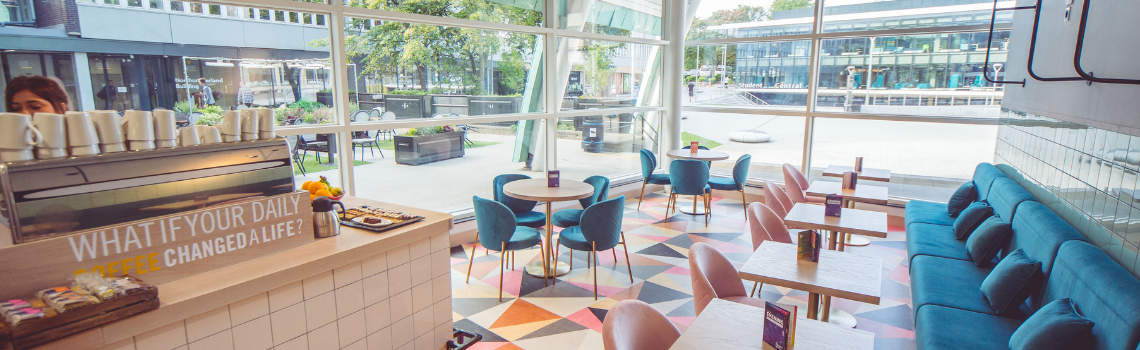 view of cafe and seating area