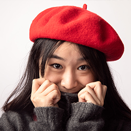 International student with red beret on 