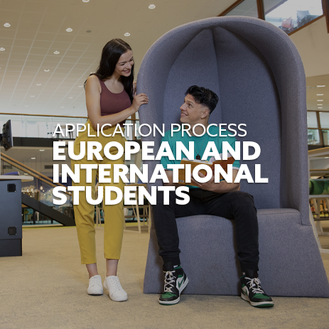 Image: a female student is leaning against a large chair which a male student is sat in, reading a textbook. Text: "Application process for European and International students"