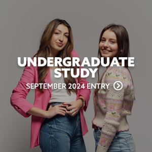 Two female identifying students stood, smiling. They are looking directly at the camera. There is text embedded on the image that reads: "Undergraduate Study - September 2024"