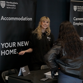 Member of staff at an open day