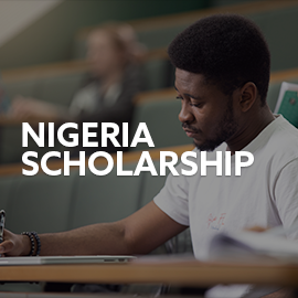 Student in lecture. Text embedded reads: Nigeria Scholarship