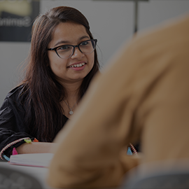 DCC Student Working at Desk