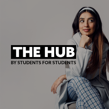 Close-up of an international student smiling against a white background. They are sat on a chair, looking off camera. There is text embedded on the image that reads: "The Hub. By students, for students"