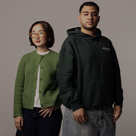 two students on grey background