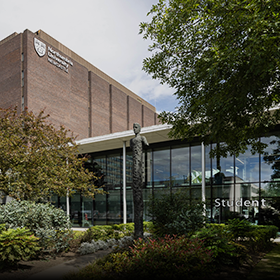 Front exterior shot of Student Central on a sunny day.