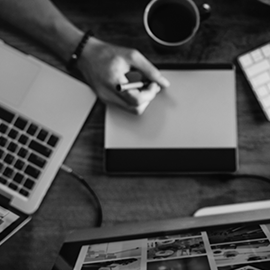 a laptop computer sitting on top of a table