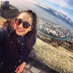 a person wearing a helmet posing for the camera