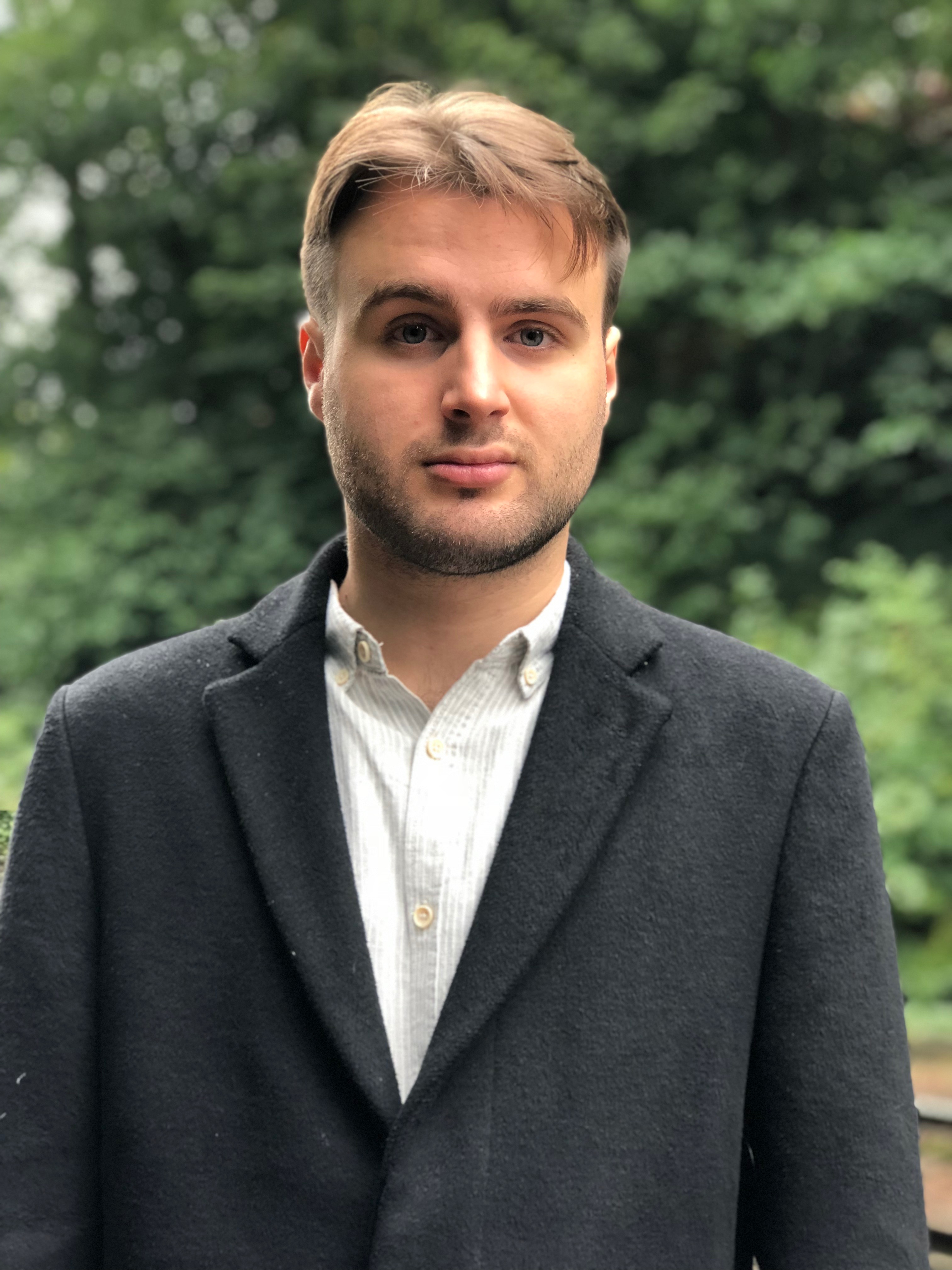 a man wearing a suit and tie