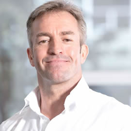 a man smiling for the camera