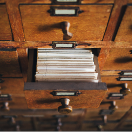 Small drawer with historical records in it