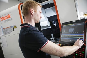 Image showing researcher using Mazak 5-axis CNC milling machine