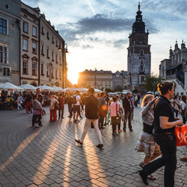 People walking in a busy market square