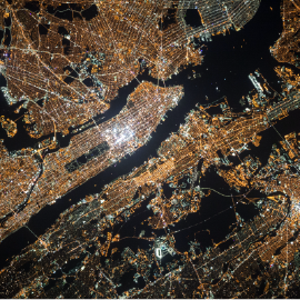 Aerial view over a city at night