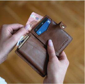 Wallet with cards and money in it