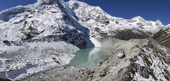 Caption:Dig Tsho glacial lake in the Langmoche valley, Nepal. The natural moraine dam impounding this lake breached catastrophically in 1985, causing extensive damage downstream. The High Mountain Asia region has the highest GLOF danger globally and accounts for the majority of the global population exposed to GLOFs.