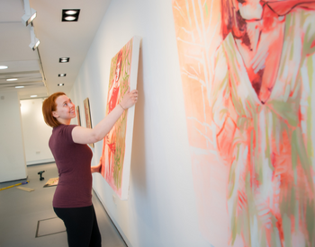 Caption: MFA student Amy Walton prepares her work for the BALTIC x Northumbria University Master of Fine Art Graduate Exhibition at Gallery North.