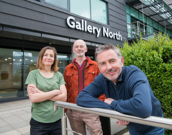 Caption: MFA student Celia Burbush, MFA co-Programme Leader Gavin Butt and Deputy Head of Arts, Steve Gilroy, are pictured outside the new look Gallery North.