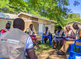 Caption: Members of the research team in Nakivale supporting Photovoice activity. Photo by Robert Turyamureeba.