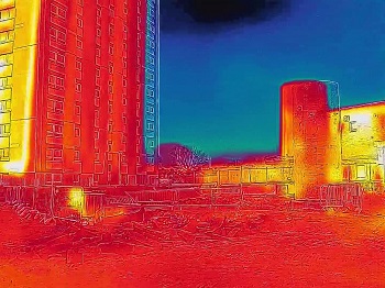 heat sensitive image of a power station with the warm areas in red and the cold in blue