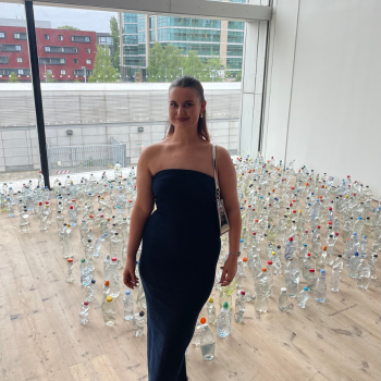 Caption: Northumbria University graduate Alice Kershaw is pictured with her work, Discarded Bottles.