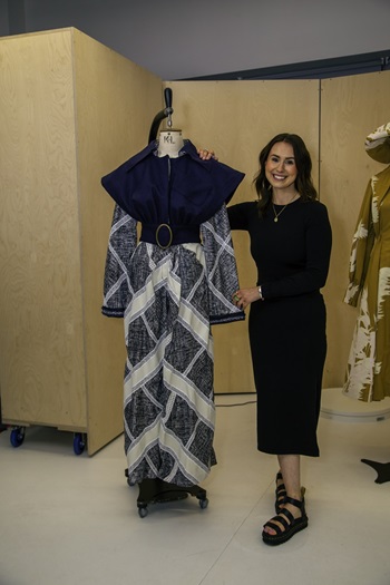 Caption: Fashion graduate Melissa Netwon with one of her womenswear looks.