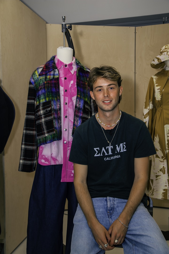 Caption: Fashion graduate Will Howard-Jones with one of his looks.